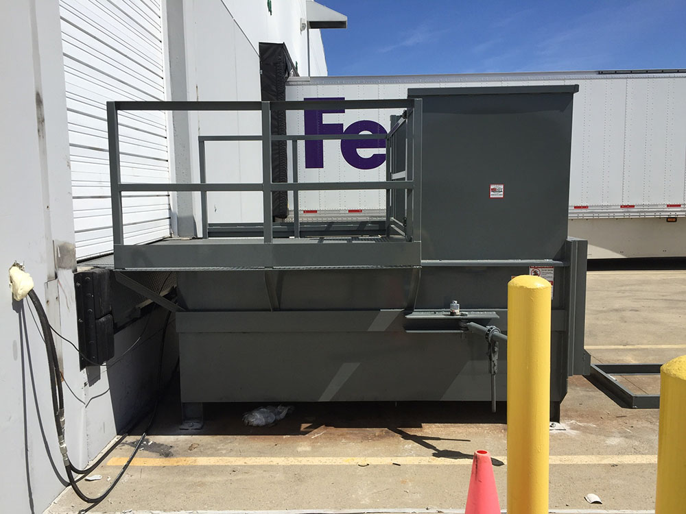 New 2-Yard Stationary Compactor at a Dock