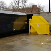 Self-Contained Compactor with Hydraulic Dumper